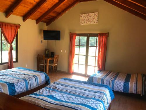 Postel nebo postele na pokoji v ubytování Posada Campestre Tasquillo