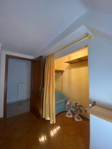 a room with a room with a bed and a window at Lucy house in Ronciglione