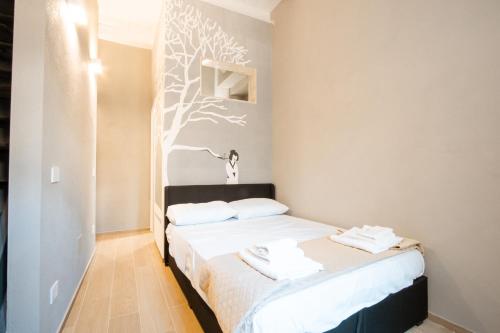 Postel nebo postele na pokoji v ubytování La Corte Terrace&Spa