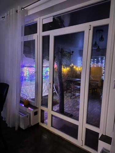 a room with a window with a view of a table at Дом для отдыха на Фонтане in Odesa