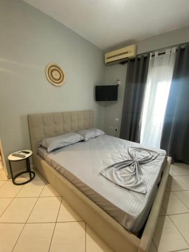 Llit o llits en una habitació de Ar Apartment