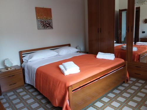 Postel nebo postele na pokoji v ubytování La casa di Rosy