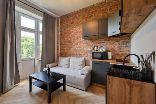 Kuchyň nebo kuchyňský kout v ubytování Industrial Apartment