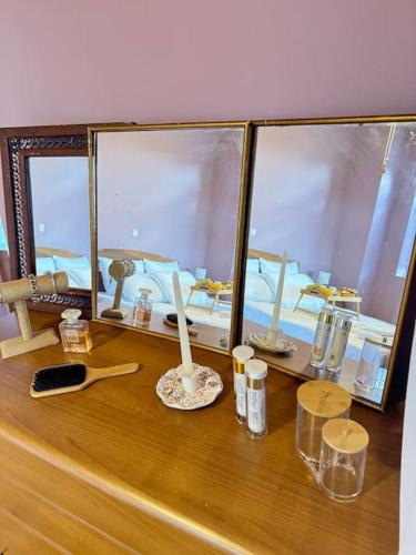 a wooden counter with some items on a table at Traditional maisonette just 15' from Kalamata in Valíra