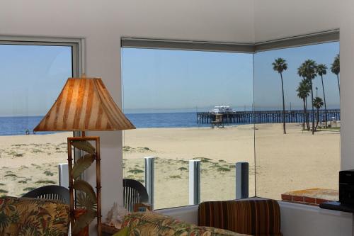 a living room with a view of the beach at 1023 E Balboa B in Newport Beach