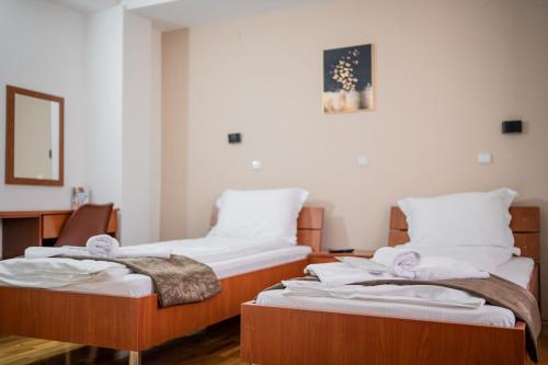 Hotel Ohridati Palaceにあるベッド