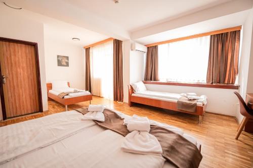Hotel Ohridati Palaceにあるベッド