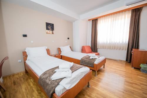 Hotel Ohridati Palaceにあるベッド