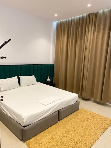 Postel nebo postele na pokoji v ubytování Guesthouse Niko