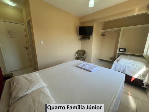 Katil atau katil-katil dalam bilik di Hotel e Pousada Areia da Praia