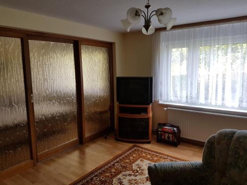 Μια τηλεόραση ή/και κέντρο ψυχαγωγίας στο Ferienhaus Uckermark