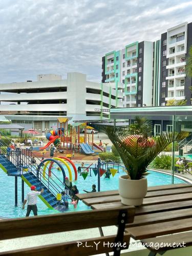 a view of a water park with a playground at Manhattan Condo Ipoh Waterpark PoolView FREE Carpark & Netflix by PLY Home in Ipoh