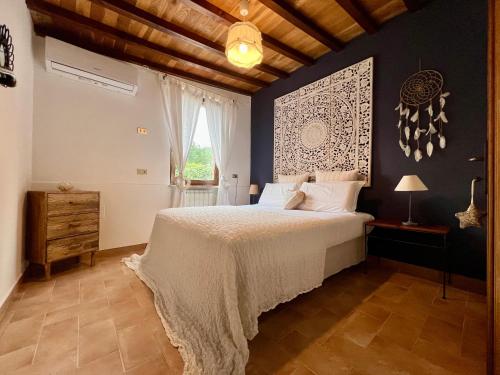 Postel nebo postele na pokoji v ubytování Le case di Lisetta Holiday homes