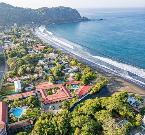 an aerial view of a beach with a resort at Beach Break Resort & CR Surf Camp in Jacó