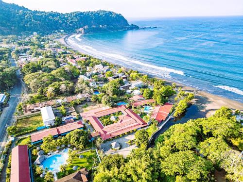 an aerial view of a beach with a resort at Beach Break Resort & CR Surf Camp in Jacó