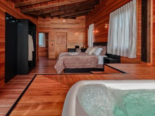 Postel nebo postele na pokoji v ubytování Cabanas Doce Recanto