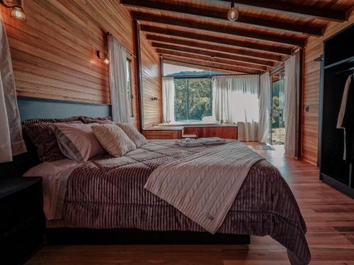 Postel nebo postele na pokoji v ubytování Cabanas Doce Recanto