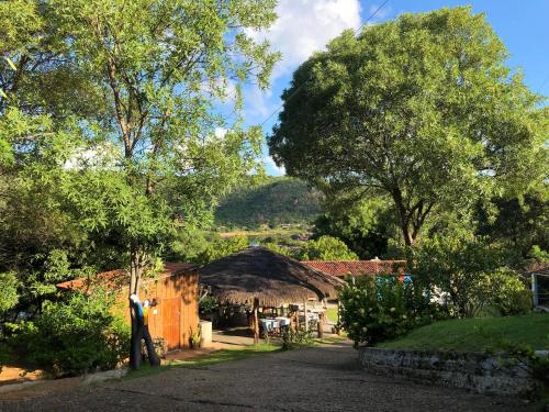 a view of a village with a thatch roof at Pousada Trilha do Velho Chico in Piranhas