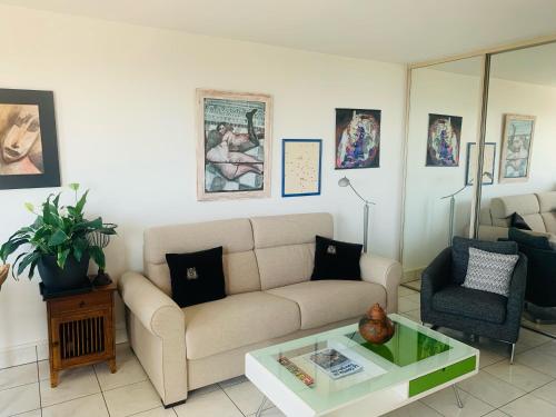 Ruang duduk di Superbe 3 pièces Villa Les Planches Vue Mer Deauville