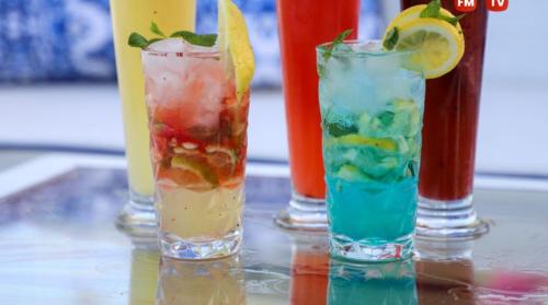 a group of four cocktails sitting on a table at Hotel Best Beach- Family Only in Chott Meriem