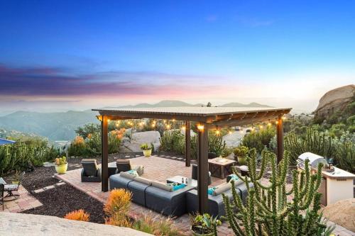 a backyard with a gazebo and cactus at Mediterranean Haven with Views in Escondido in Escondido