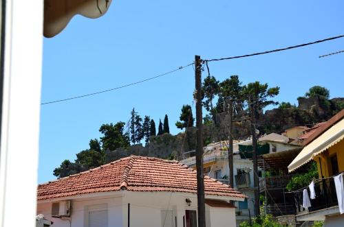 a view of a house with a mountain in the background at Villa Yvonne by EY Villas in Parga