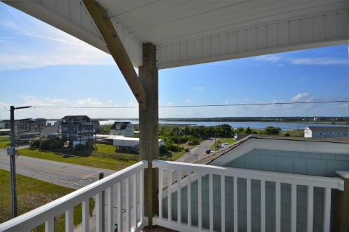 a view from the balcony of a house at Topsail Turvy in North Topsail Beach