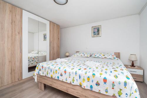 Katil atau katil-katil dalam bilik di Apartments Hrvatic