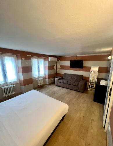 Uma cama ou camas num quarto em Room Verona Ai Conti