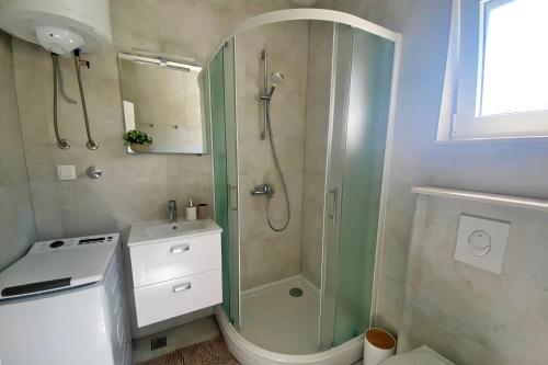 Koupelna v ubytování Apartmani Portina