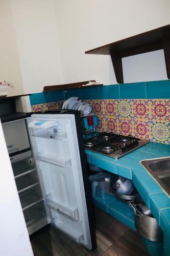 Dapur atau dapur kecil di Eco Hotel Campestre Atlantis San Joaquín La Mesa
