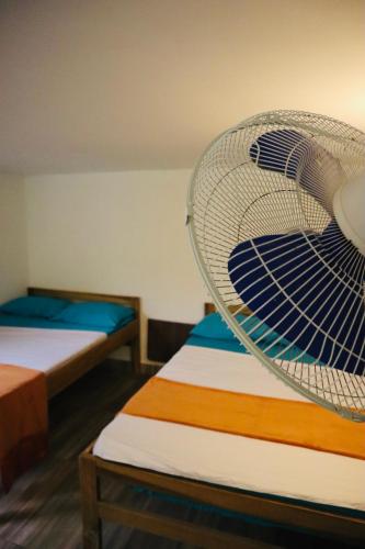 Katil atau katil-katil dalam bilik di Eco Hotel Campestre Atlantis San Joaquín La Mesa