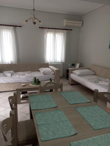 Katil atau katil-katil dalam bilik di Lefakis Aegean Breeze Apartment