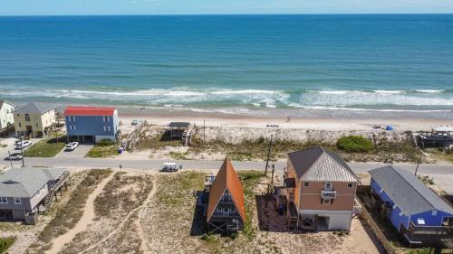 an aerial view of a beach with houses and the ocean at Copper Top in West Onslow Beach