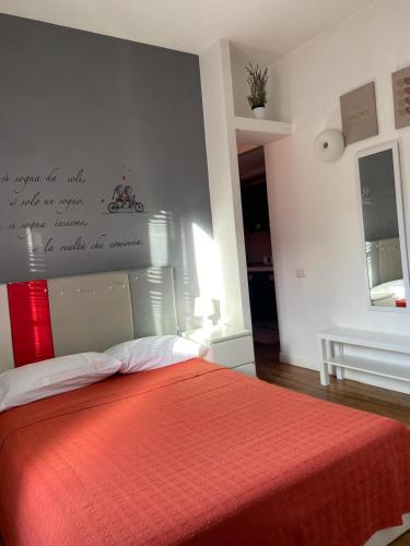 Ένα ή περισσότερα κρεβάτια σε δωμάτιο στο Piccolo Sogno Apartment