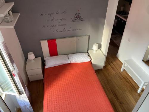 Ένα ή περισσότερα κρεβάτια σε δωμάτιο στο Piccolo Sogno Apartment