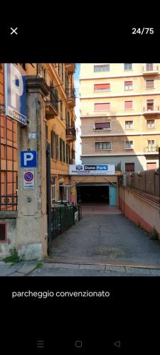 an empty street in a city with a building at Casa Matilde in Genova
