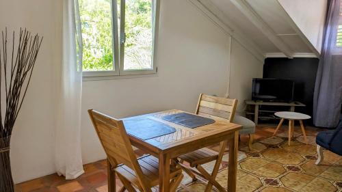 Et tv og/eller underholdning på Appartement Tropical Garden