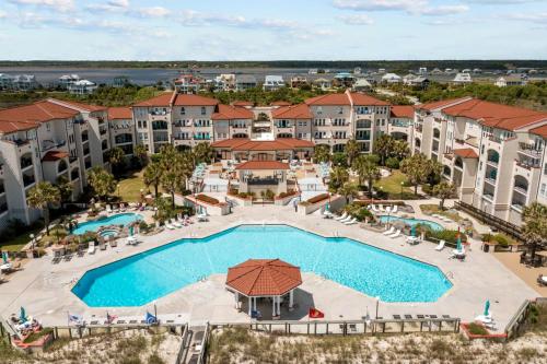 an aerial view of a pool at a resort at Villa Capriani 317A in North Topsail Beach