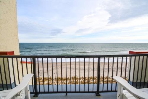 a view of the beach from the balcony of a condo at Villa Capriani 317A in North Topsail Beach