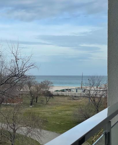 a view of the beach from a balcony at Selena by the sea in Mamaia