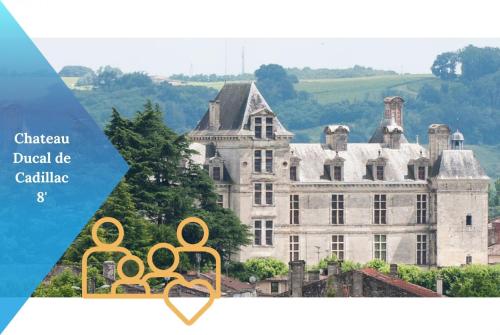a picture of an old castle with olympic rings at Évasion à proximité de Bordeaux - Piscine Privée in Podensac