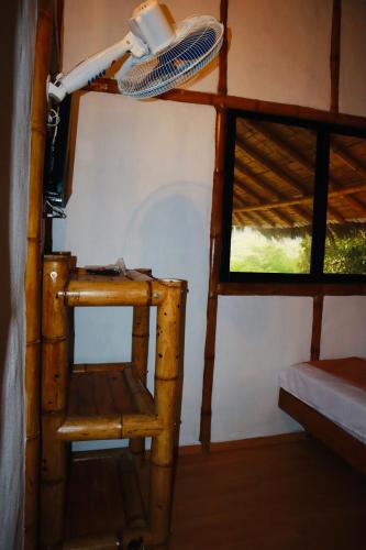 Katil dua tingkat atau katil-katil dua tingkat dalam bilik di Eco Hotel Campestre Atlantis San Joaquín La Mesa