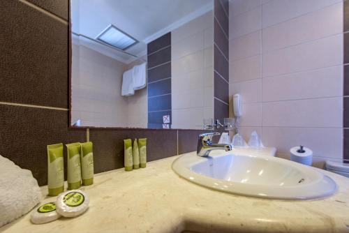 Kúpeľňa v ubytovaní Manousos City Hotel