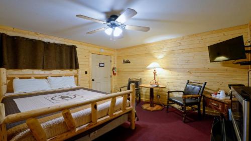 En eller flere senge i et værelse på Arrowhead 07 Deluxe