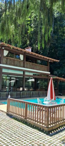Πισίνα στο ή κοντά στο Pousada Demuner House