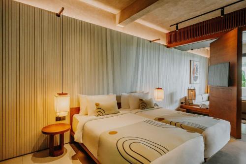 The Komu Canggu Baliにあるベッド