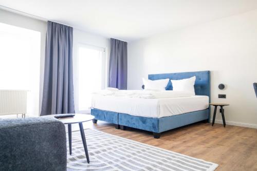 Ένα ή περισσότερα κρεβάτια σε δωμάτιο στο Johouse Zingst Johouse Zimmer 21