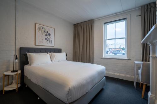 Katil atau katil-katil dalam bilik di Urban Nook Serviced Apartments