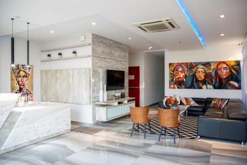 Rúm í herbergi á Nobleza Apart Hotel